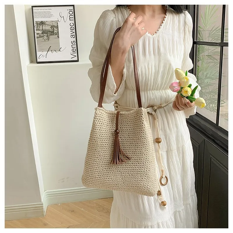 Tassel straw woven tote bag ha - огляд і ціна Tote Bag Beach