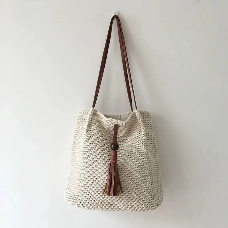 Tassel straw woven tote bag ha - огляд і ціна Tote Bag Beach